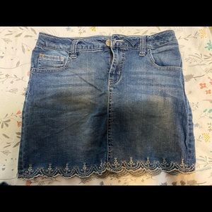 Scalloped edge denim skirt